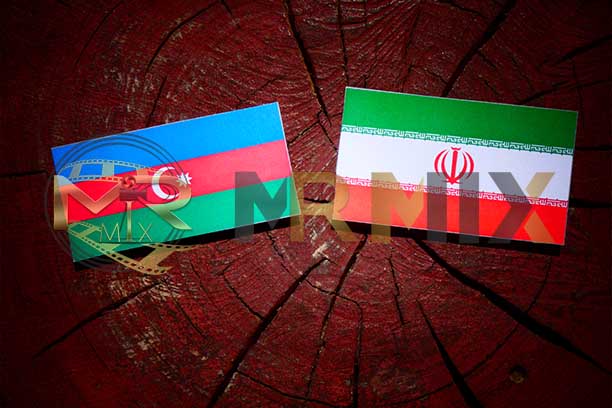 عکس استوک پرچم آذربایجان با پرچم ایران روی کنده درخت