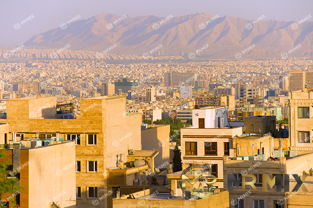 عکس استوک ساختمان های مسکونی تهران در غروب آفتاب