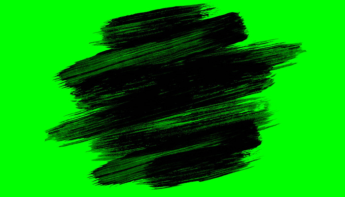 فوتیج لکه سیاه براش قلمو روی پرده سبز