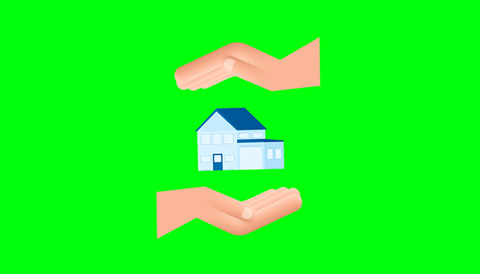 فوتیج پرده سبز دست که خانه ای را در دست دارند