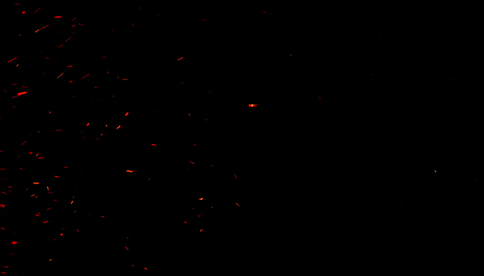 فوتیج اسلوموشن ذرات معلق سوزاننده آتش در پس زمینه مشکی